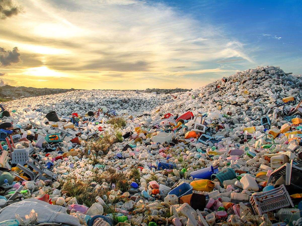 An outdoor field full of a variety of difficult to recycle waste