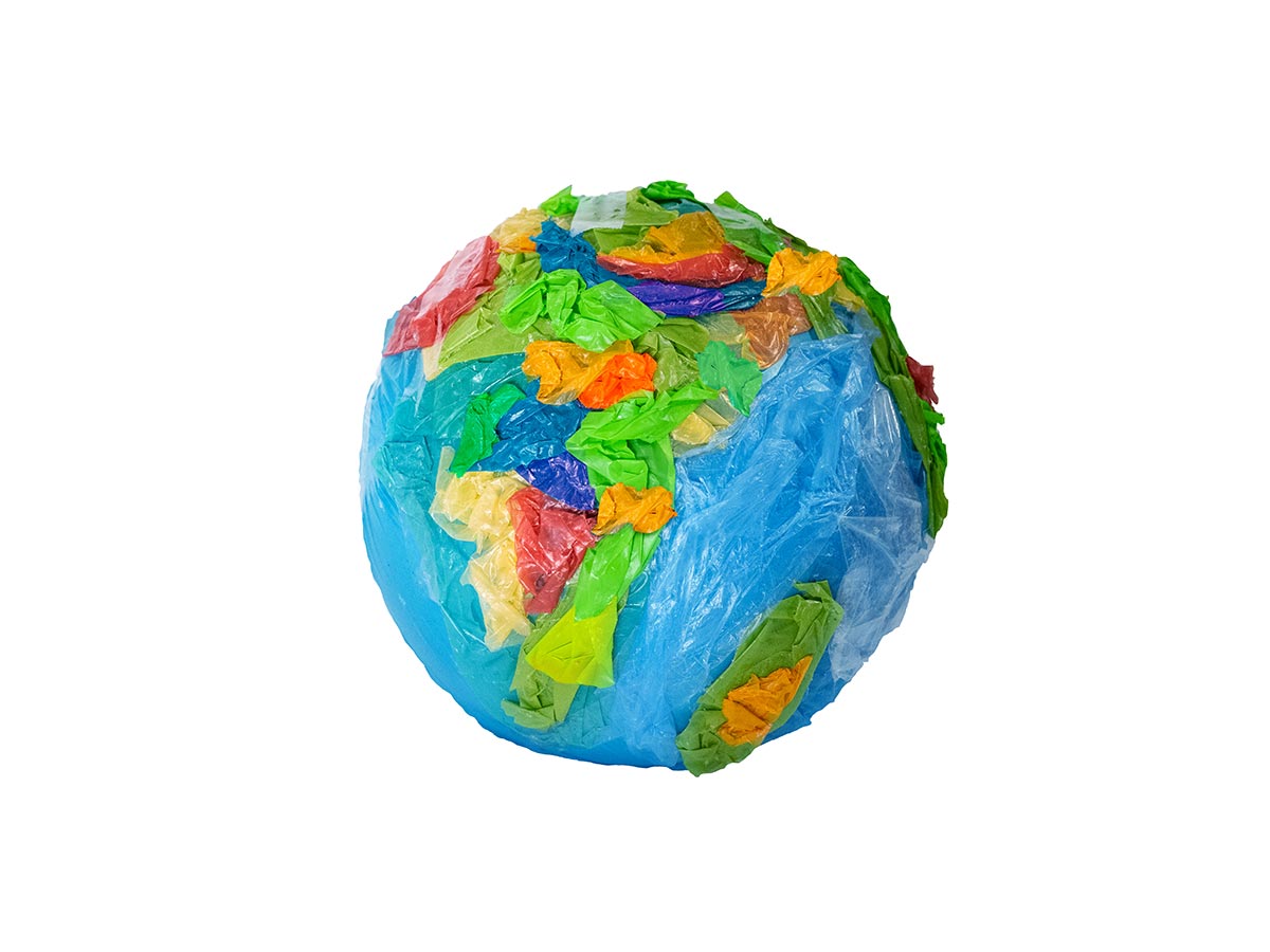 A depiction of the earth made from various plastics